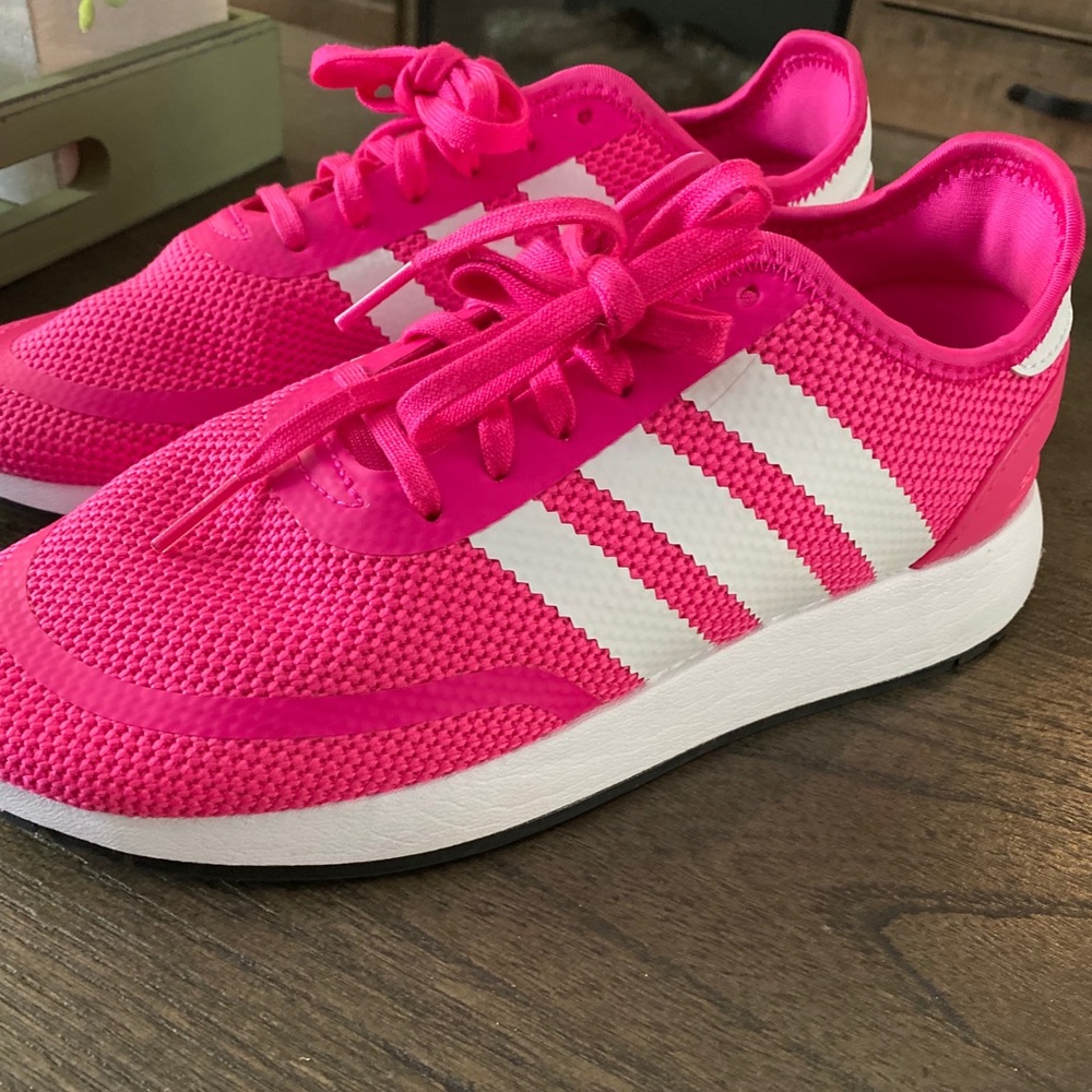 Hot pink Adidas sneakers. Work once. Runs big.
